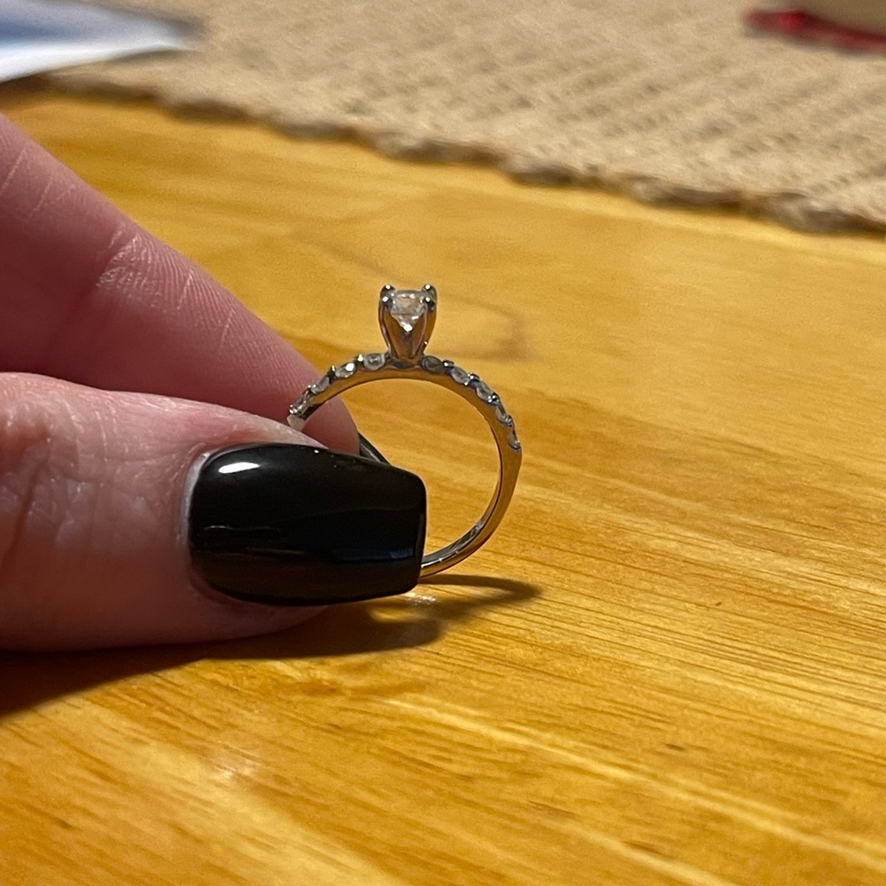 14K white gold diamond engagement ring. .38 ct. Wt. .68cttw. Size 5.5.
